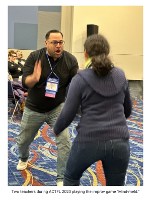 Two teachers during ACTFL 2023 playing the improv game 