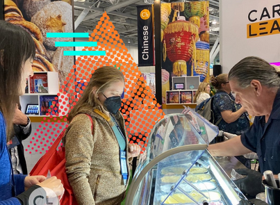 Woman getting gelato served at ACTFL 2022